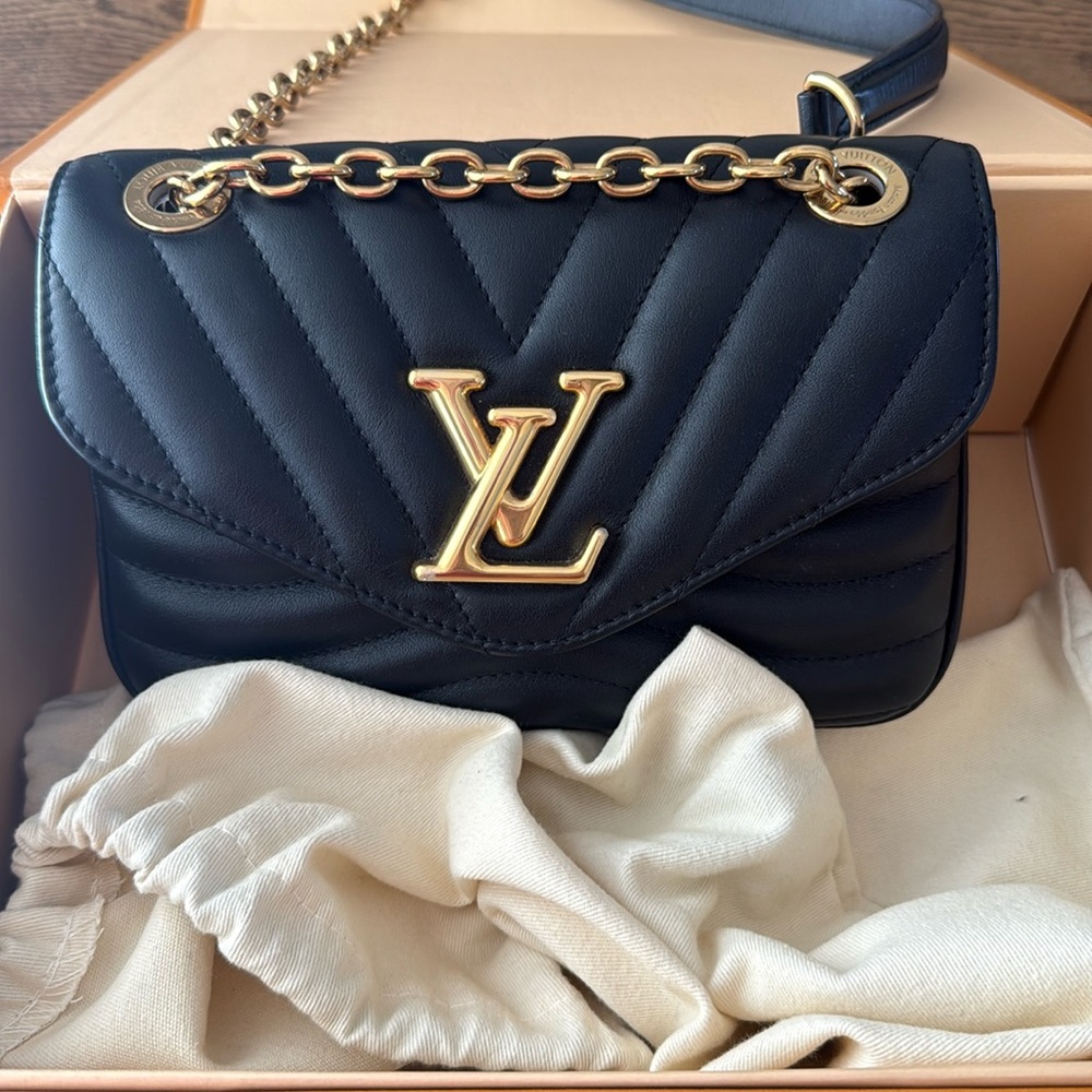 Louis Vuitton New Wave PM. New condition without tags, plastic still on hardware